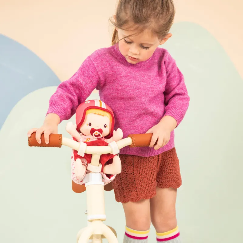 Muñeca de tela Lena y asiento de bicicleta