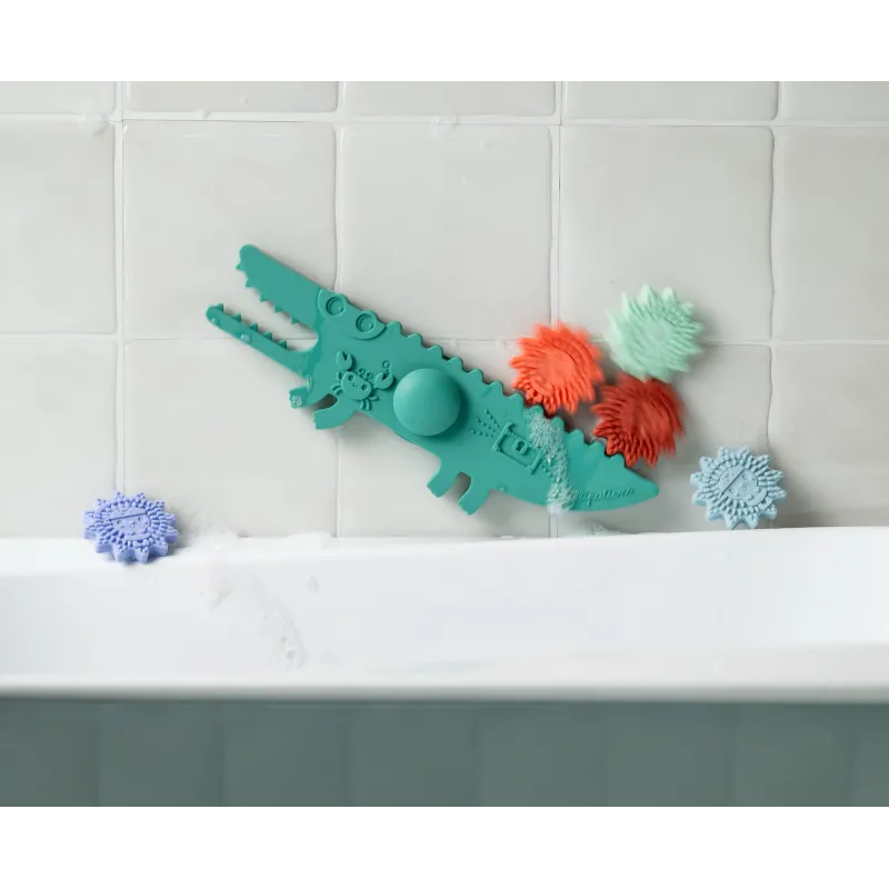 Señal de baño balancín cocodrilo