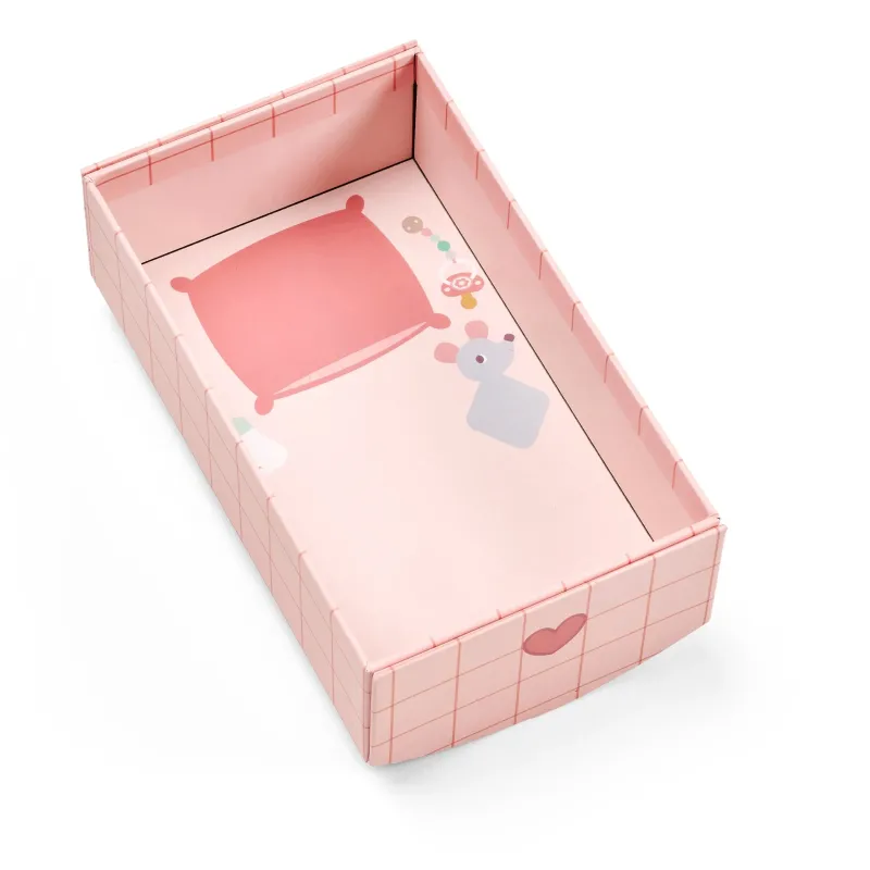 Mini Bébé Jade 18 cm | Stoffen pop met roze bedje